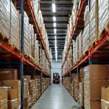 Organized warehouse with shelves and boxes