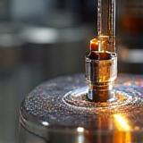 Metal component undergoing surface treatment process